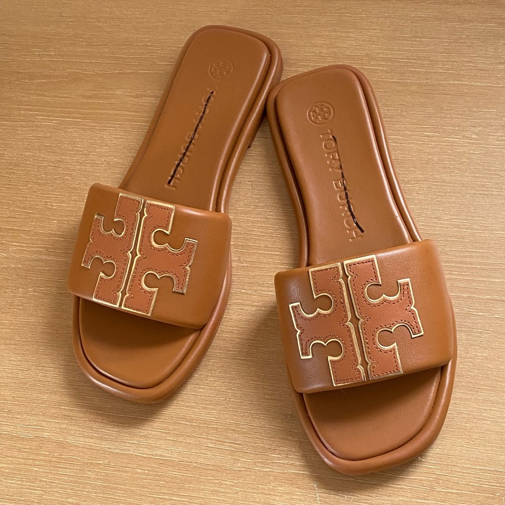 Tory Burch embossed-logo slip-on sandals size 7